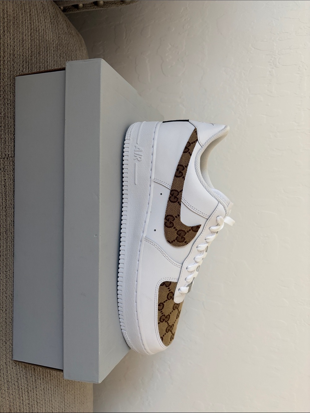 Nike Men’s White Sneakers with Brown Monogram Accents